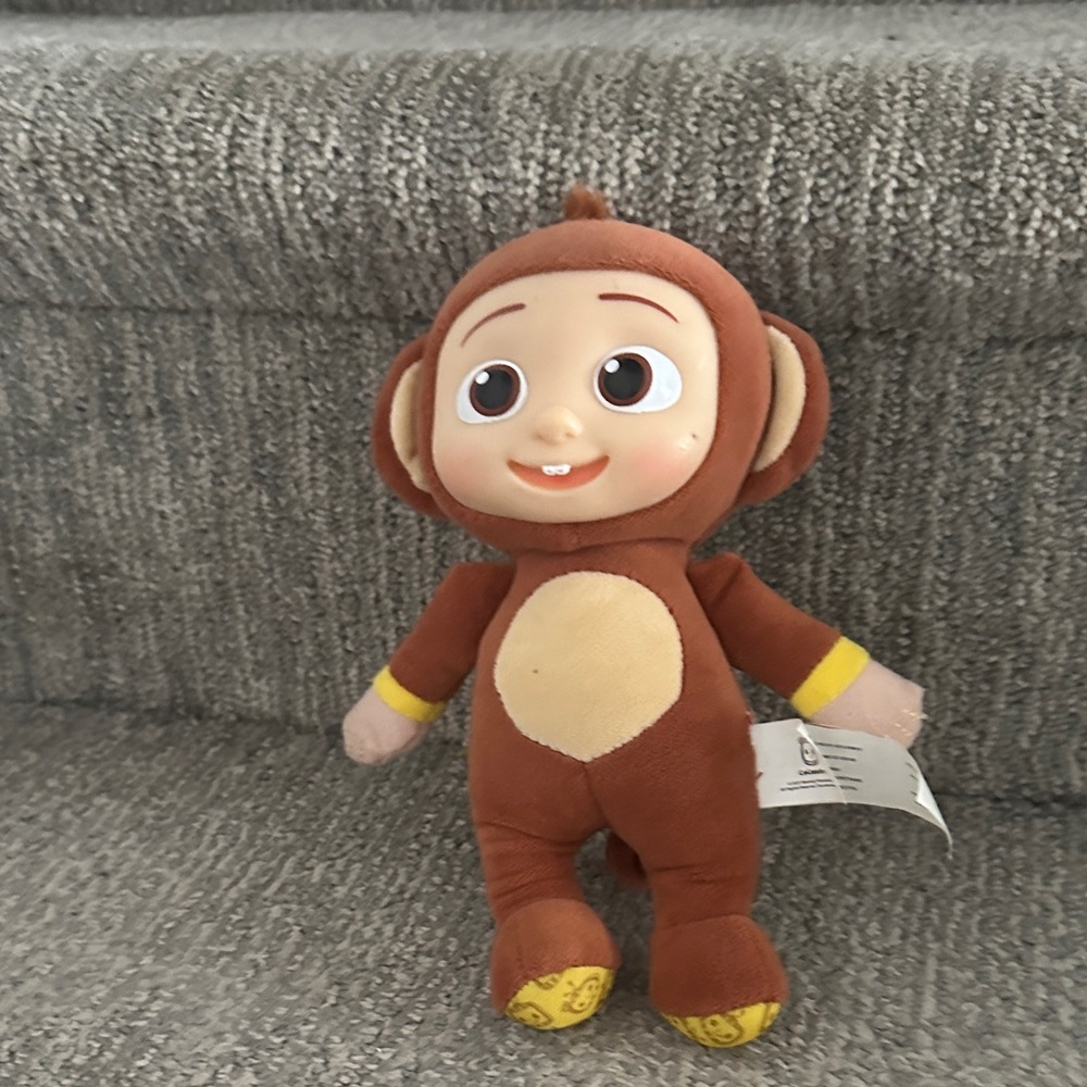 CoComelon JJ monkey plush toy.